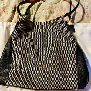 Brand new coach bag in the original carrying bag